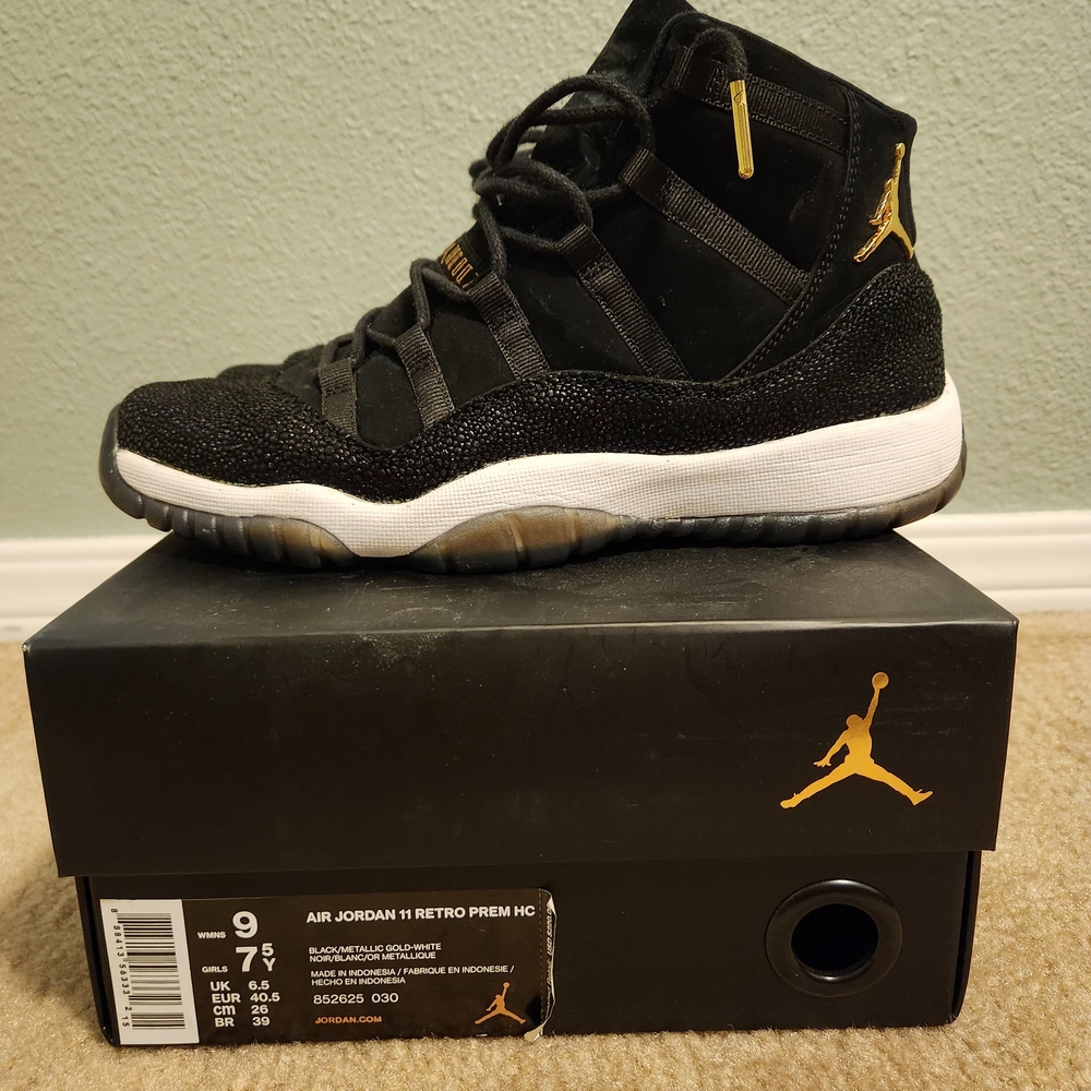 Nike Air Jordan 11 Retro Black and Gold Sneakers